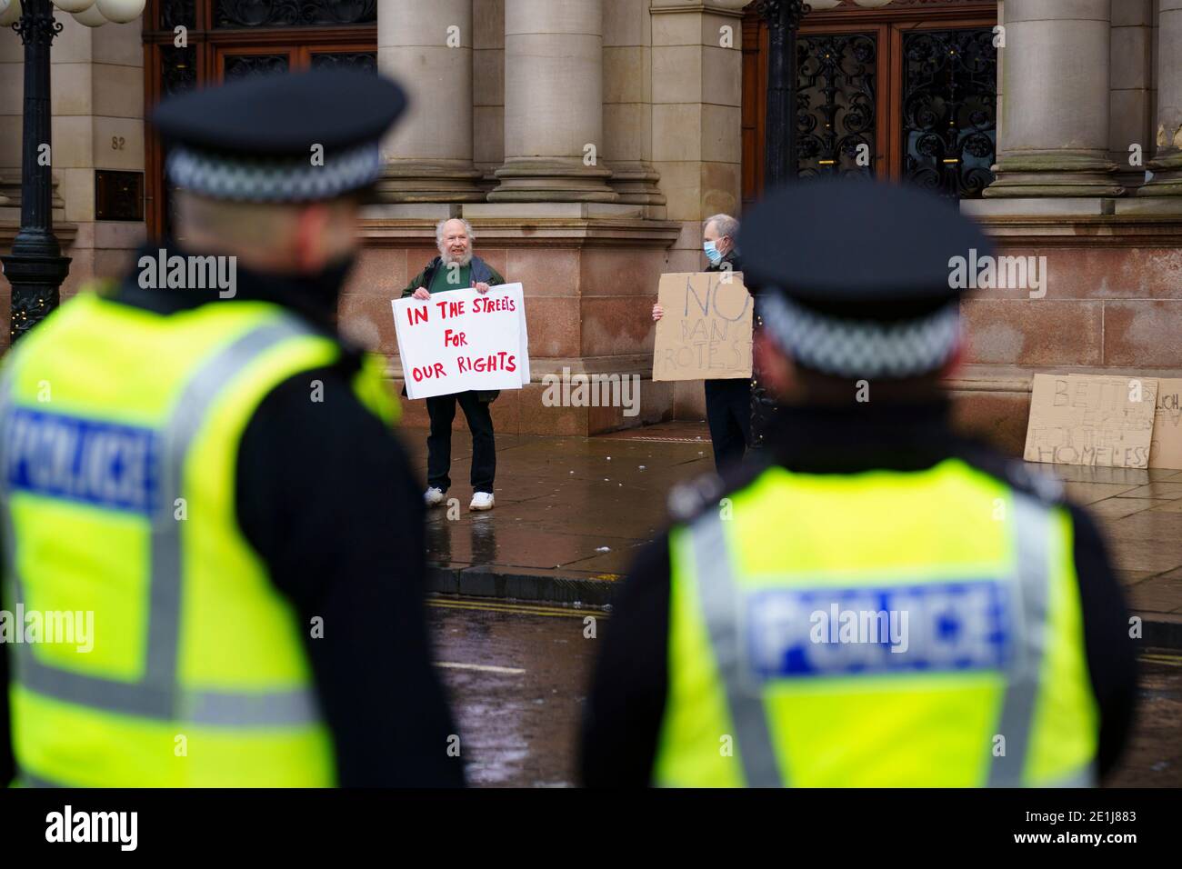 Glasgow, Scotland, UK. 7 January 2021. Anti lockdown protest outside Glasgow City Chambers led by activist Sean Clerkin.  The protesters called on the Scottish Government to remove their ban on the freedom to protest and demonstrate which is contrary to articles 10 and 11 of the European Convention of Human Rights which emphasises freedom of expression and the right to demonstrate and protest.    Iain Masterton/Alamy Live News Stock Photo