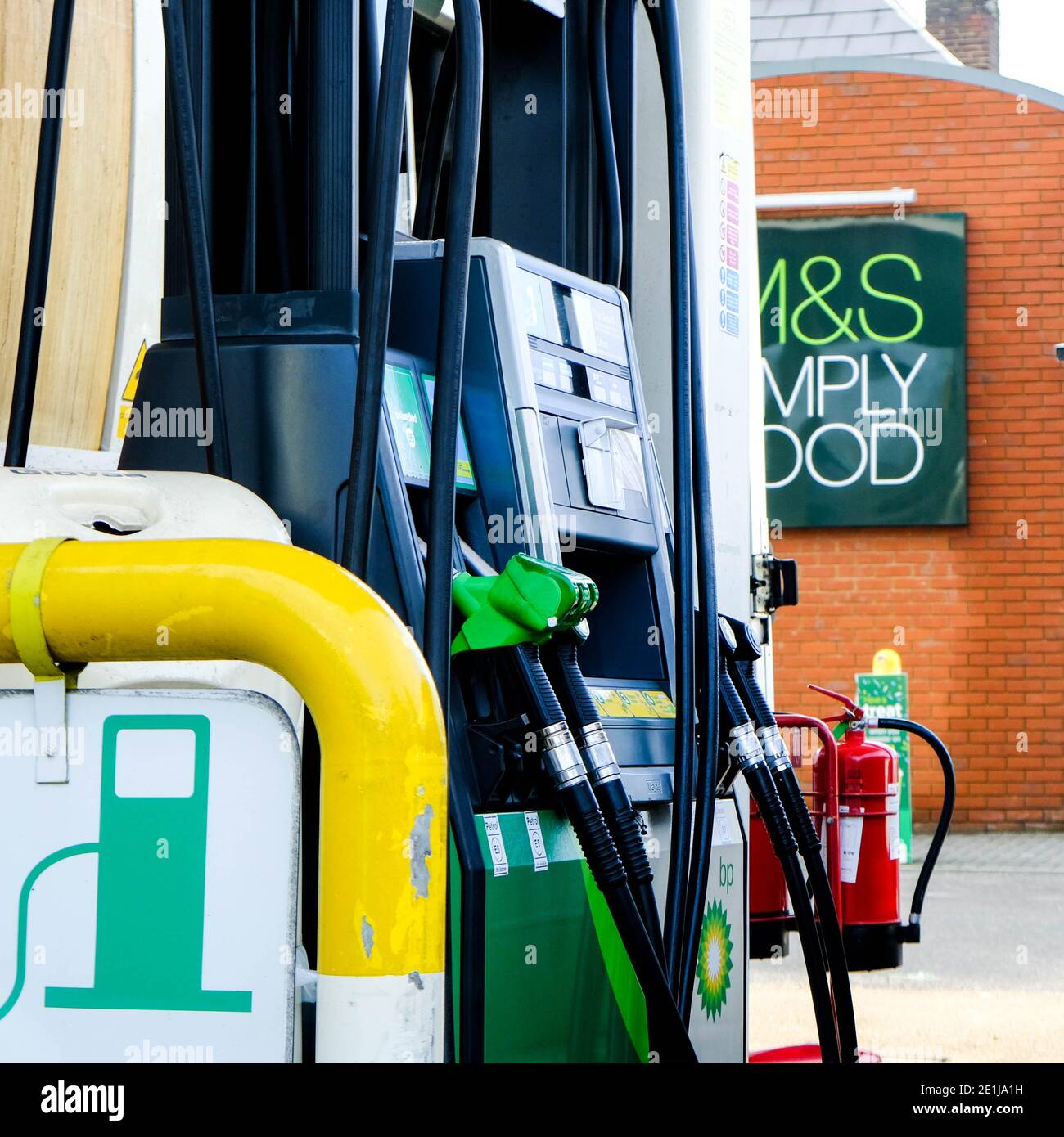 Petrol pumps at a bp petrol station in london hires stock photography