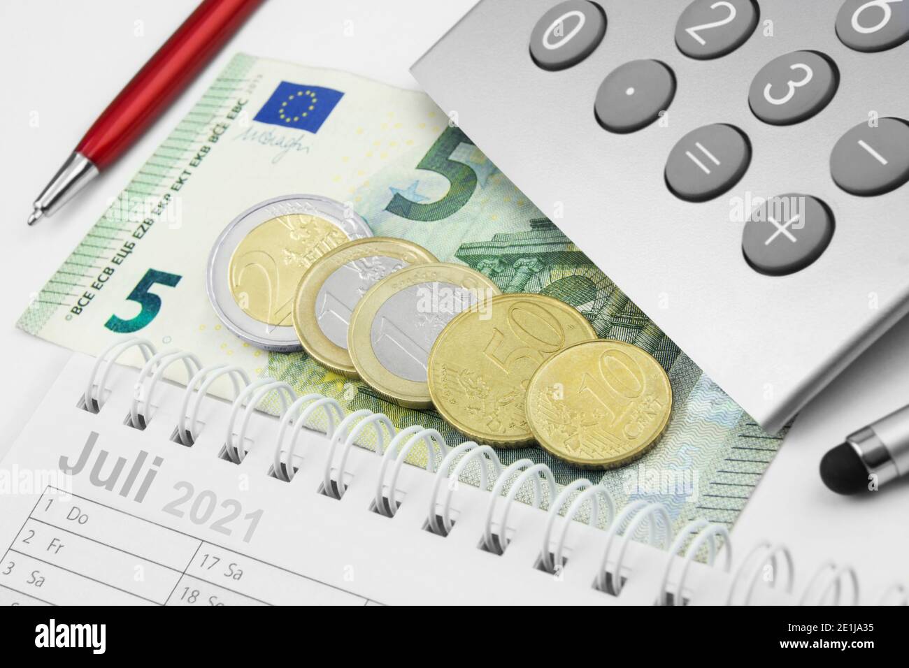 Minimum wage 9,60 Euro and calculator July 2021 Stock Photo