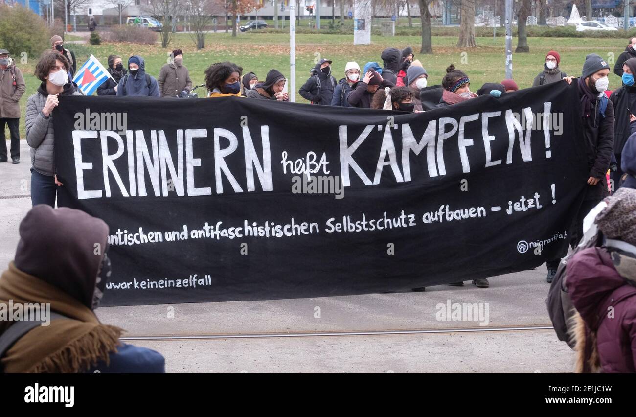 Dessau, Germany. 07th Jan, 2021. Participants of a demonstration in memory of Oury Jalloh hold a banner. The asylum seeker from Sierra Leone had died in a police cell in 2005 under unexplained circumstances. Credit: Sebastian Willnow/dpa-Zentralbild/dpa/Alamy Live News Stock Photo
