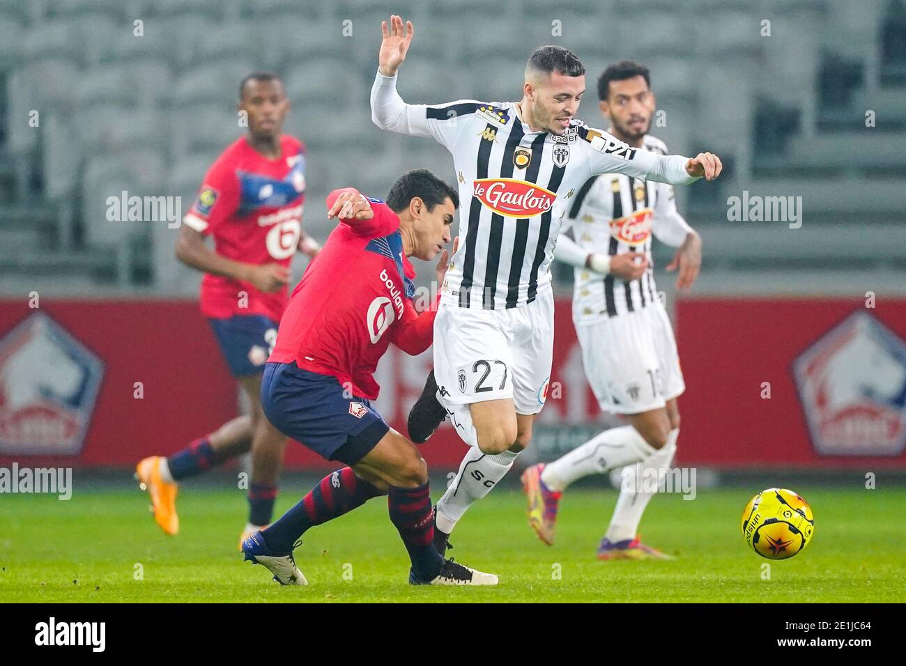 LILLE, FRANCE - JANUARY 6: Benjamin Andre of Lille OSC, Mathias Pereira  Lage of Angers SCO during the Ligue 1 match between Lille OSC and Angers  SCO a Stock Photo - Alamy