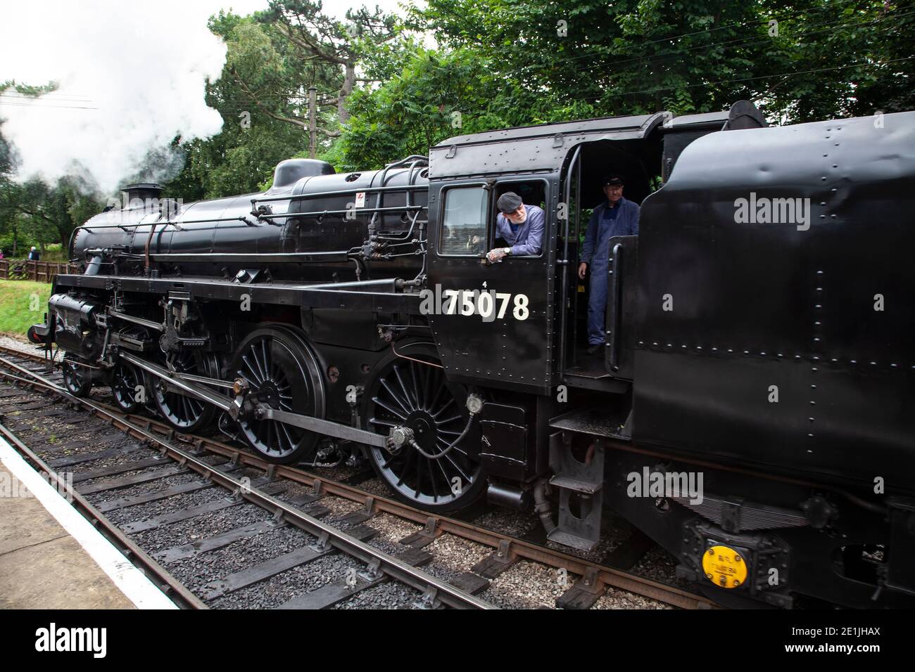 Ex British Railways Standard Class 4MT steam locomotive number 75078  4-6-0 in steam at Oxenhope station on Keighley & Worth Valley heritage line Stock Photo