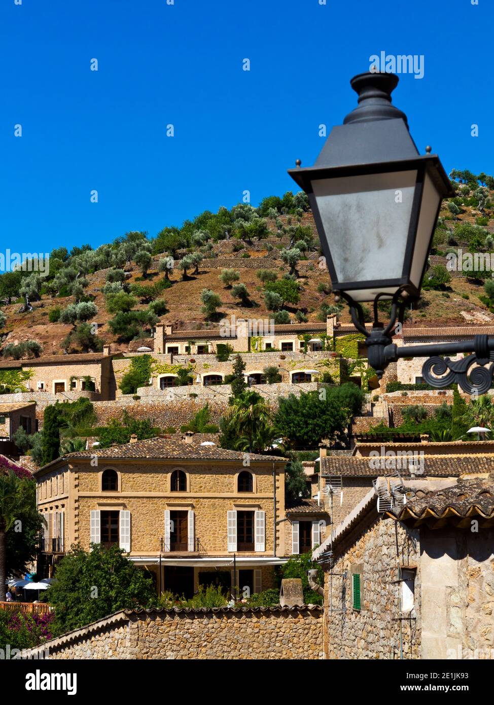 Houses in Deia a small coastal village in the Serra de Tramuntana mountains in north west Mallorca Spain famous for its musical and literary residents Stock Photo