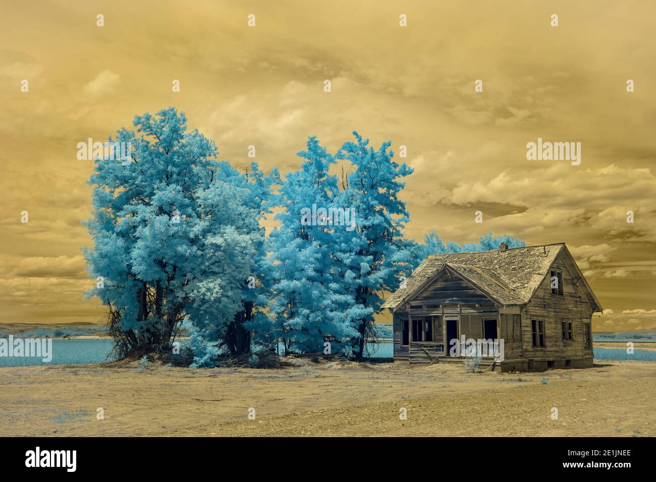 Infrared photo of an abandoned farmstead home near Vale in eastern Oregon. Stock Photo