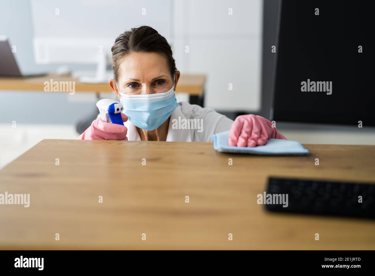 Woman holding a mask painting hi-res stock photography and images - Alamy
