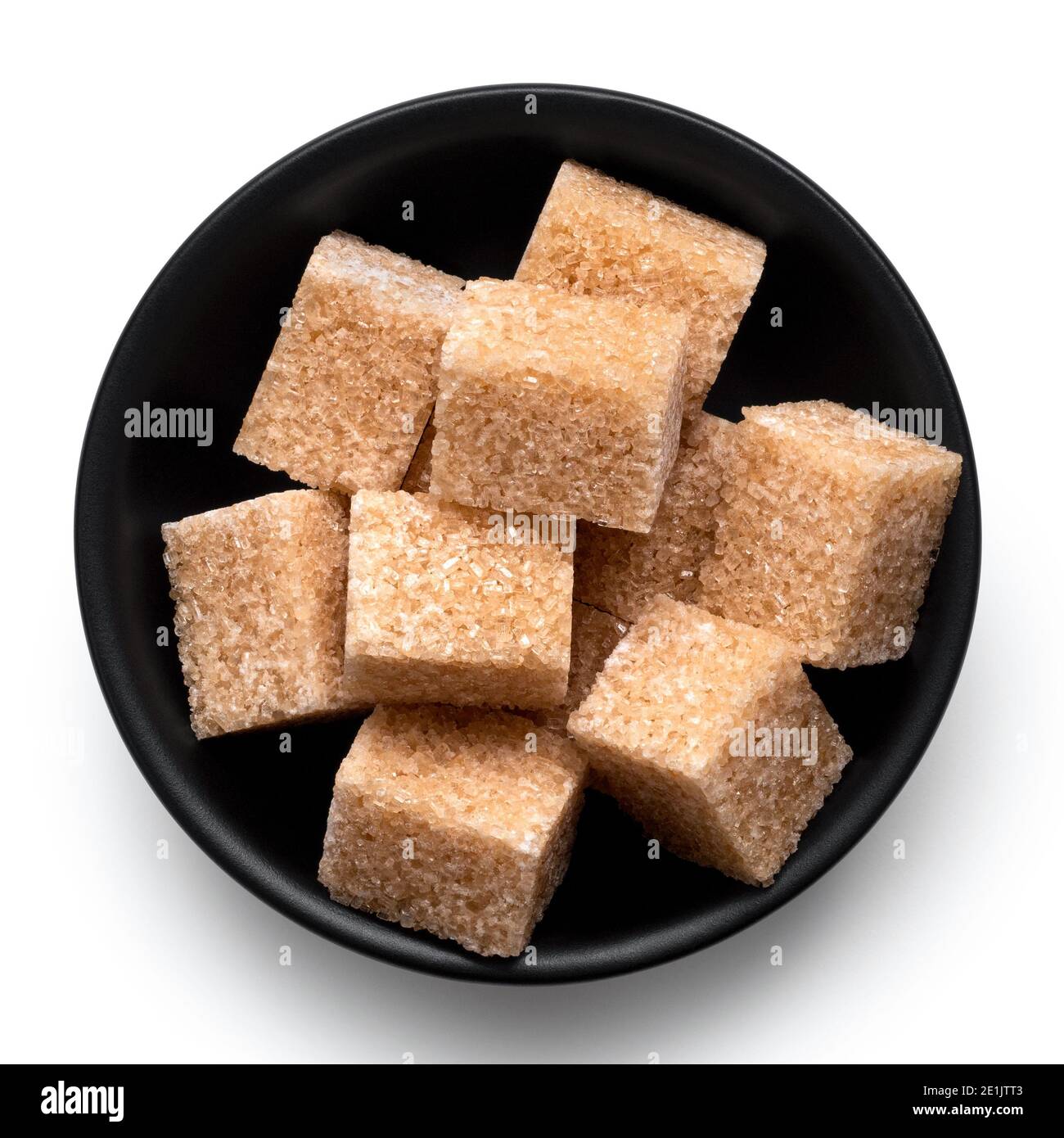 Brown sugar cubes in white ceramic bowl isolated on white. Top view Stock Photo Alamy
