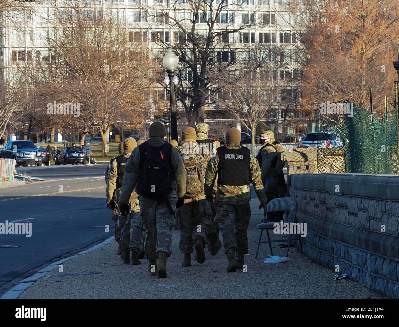 Washington, District of Columbia, USA. 7th Jan, 2021. As the sun rose on the U.S. Capitol, members of the National Guard march to their assembly point. Credit: Sue Dorfman/ZUMA Wire/Alamy Live News Stock Photo