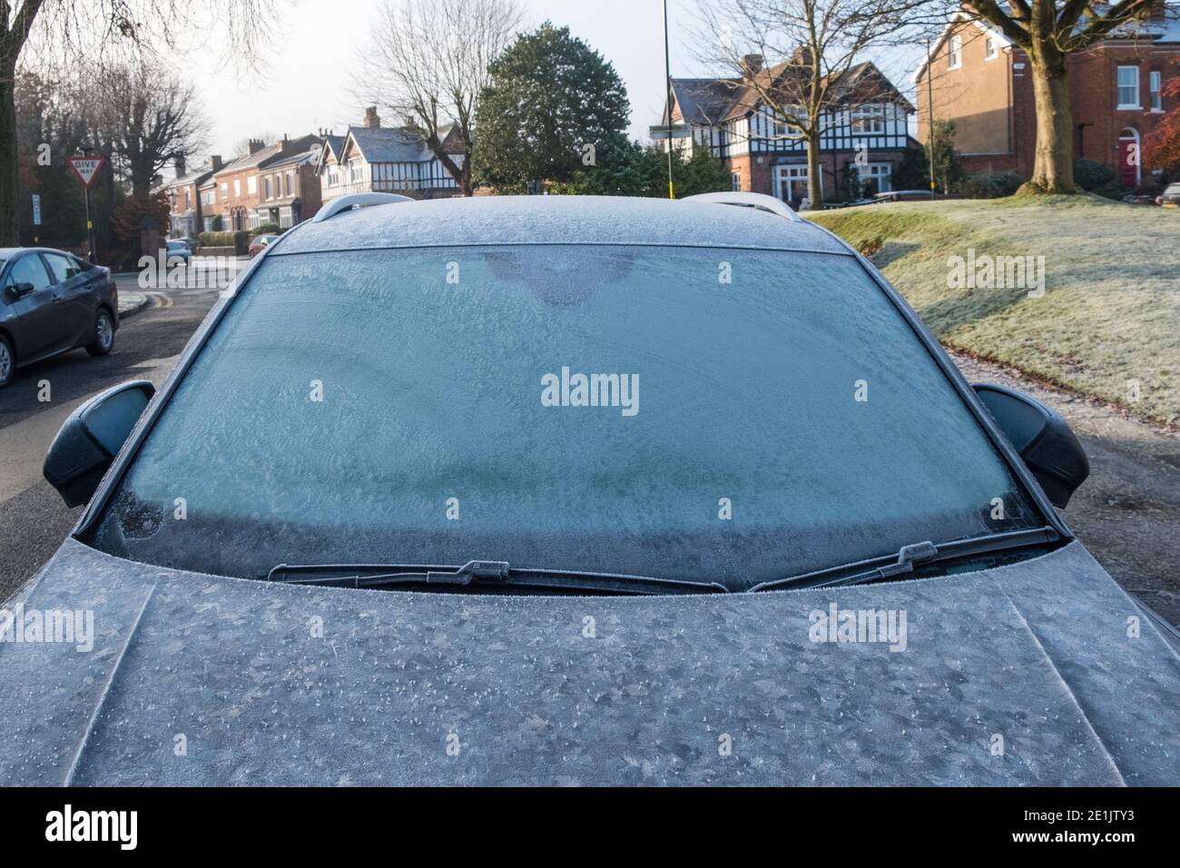 Frozen car window in cold weather spell Stock Photo