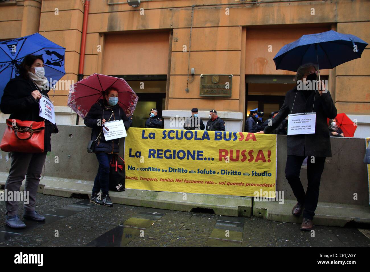 Today all schools of all class and levels should be reopened throughout the regional territory of Campania, as ordered by the Ministry of Education. The Decree number 1 of the Campania Region, has postponed the opening for kindergarten and the first two classes of primary school to the day 11 January. The other classes of the elementary school will enter the day 18 January. Finally, the middle schools and high schools on the day 25 January.Protest of teachers and students in front of the Offices of the Campania Region . They complain about the closure of schools for too long and the lack of fu Stock Photo