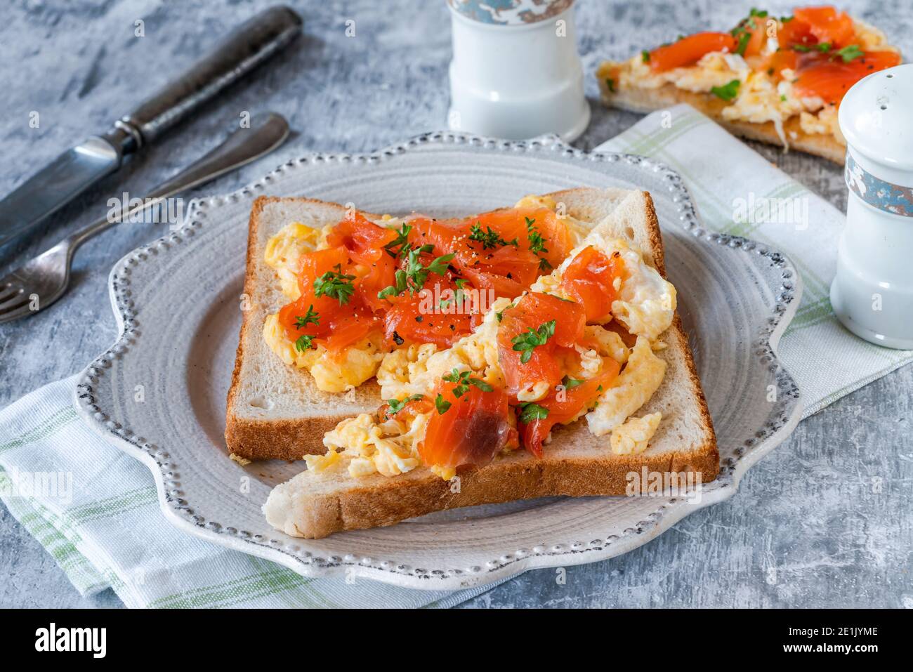 Scrambled egg on toast with smoked salmon Stock Photo Alamy