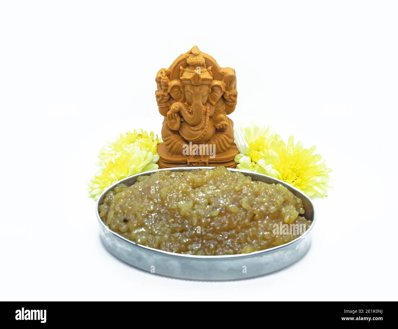 Pongal festival date prayer of the Hindu god Ganesha with flowers and