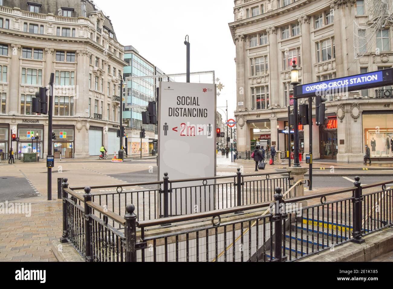 A social distancing sign on an empty Oxford Circus in London, during the third national coronavirus lockdown in England. Stock Photo