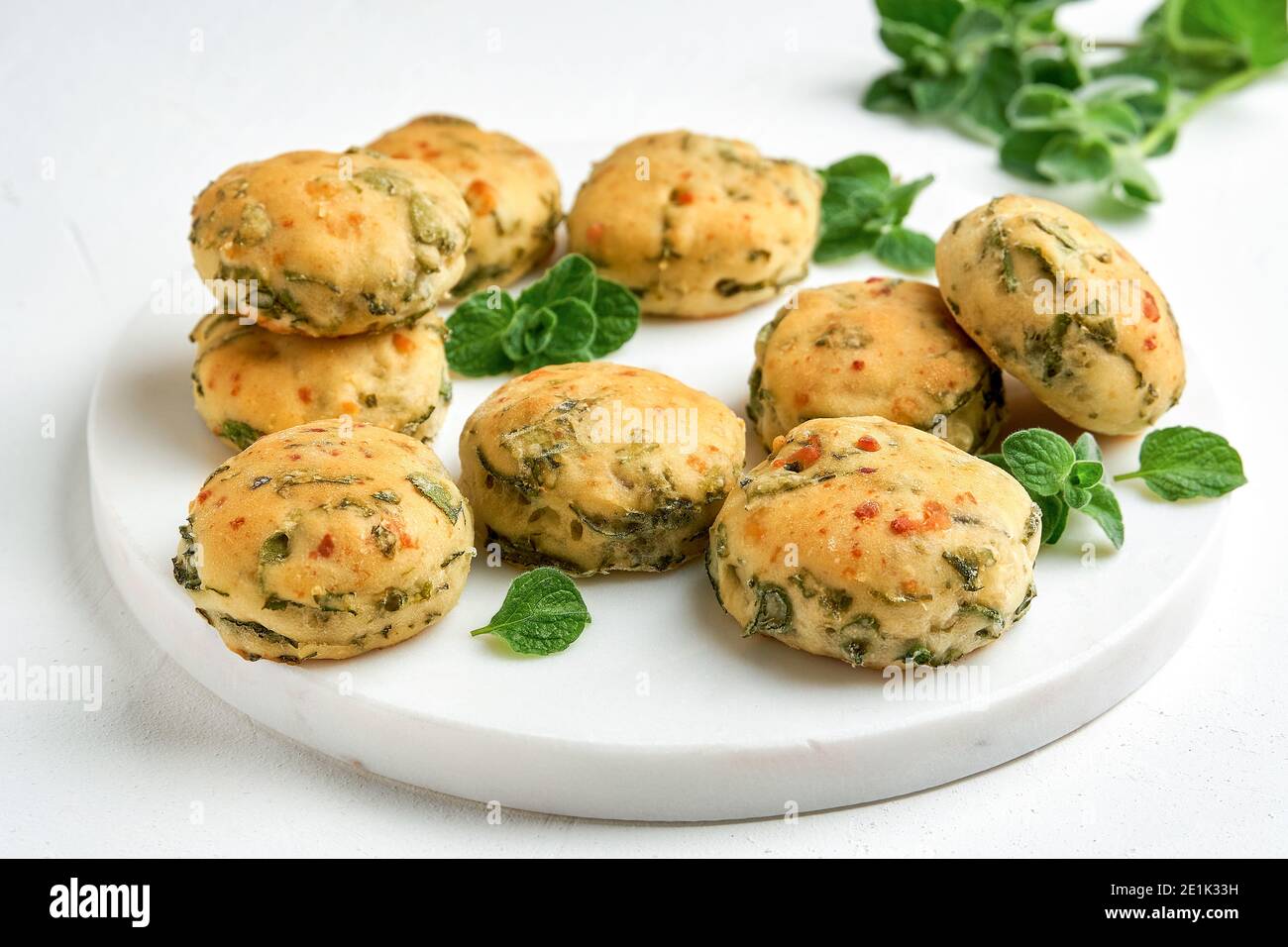 Homemade buns with fresh herbs and cheese Stock Photo