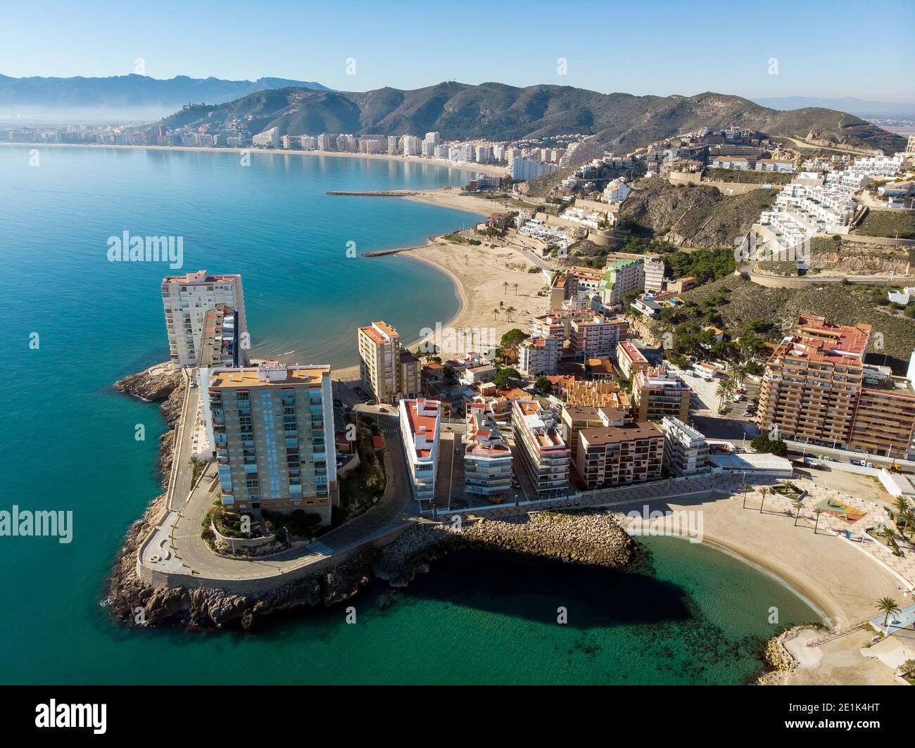 Aerial drone point of view Cullera townscape during sunny winter day. Touristic famous place. Province of Alicante, Costa Blanca, Spain Stock Photo