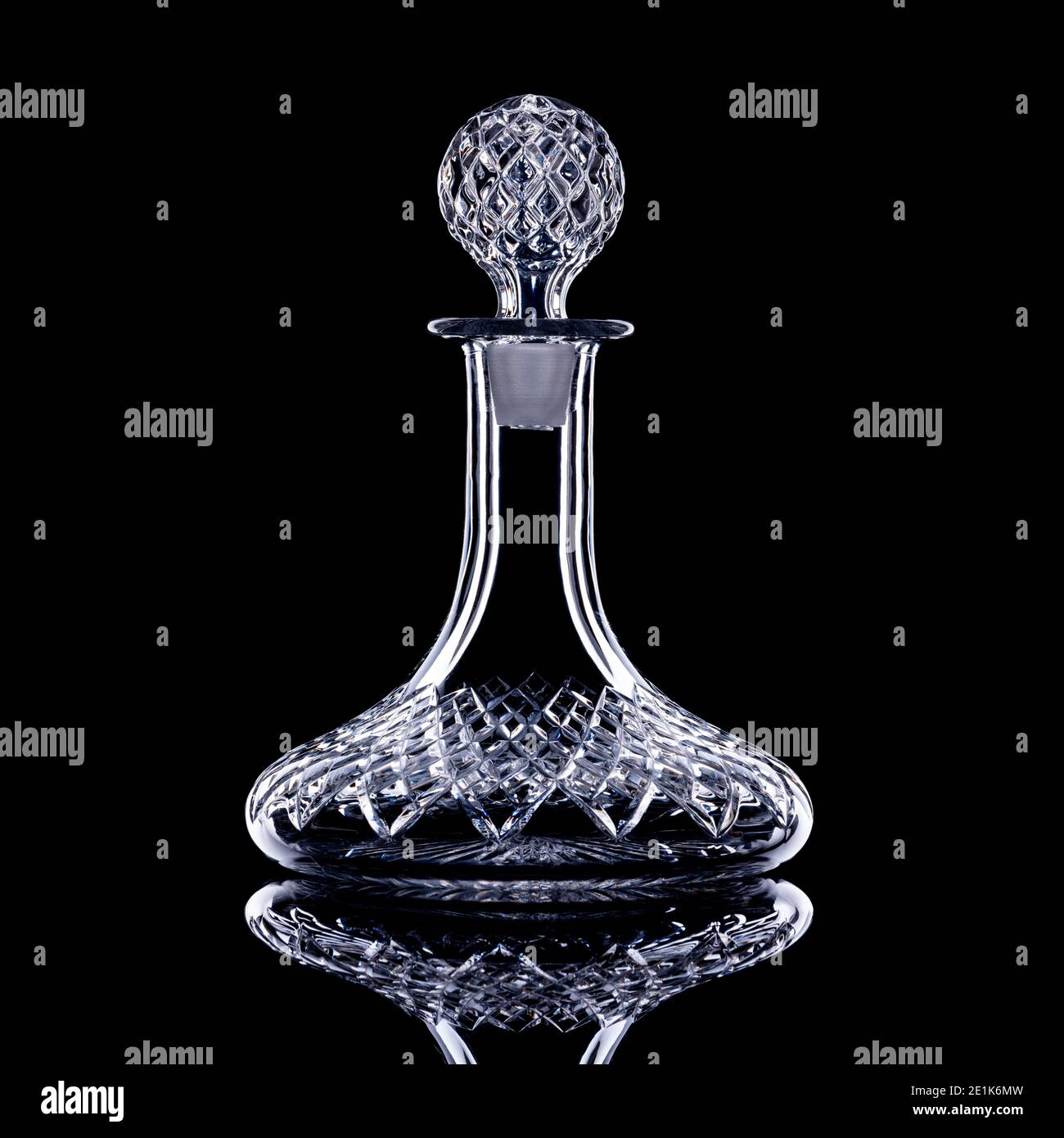 Empty ship's decanter on black background Stock Photo