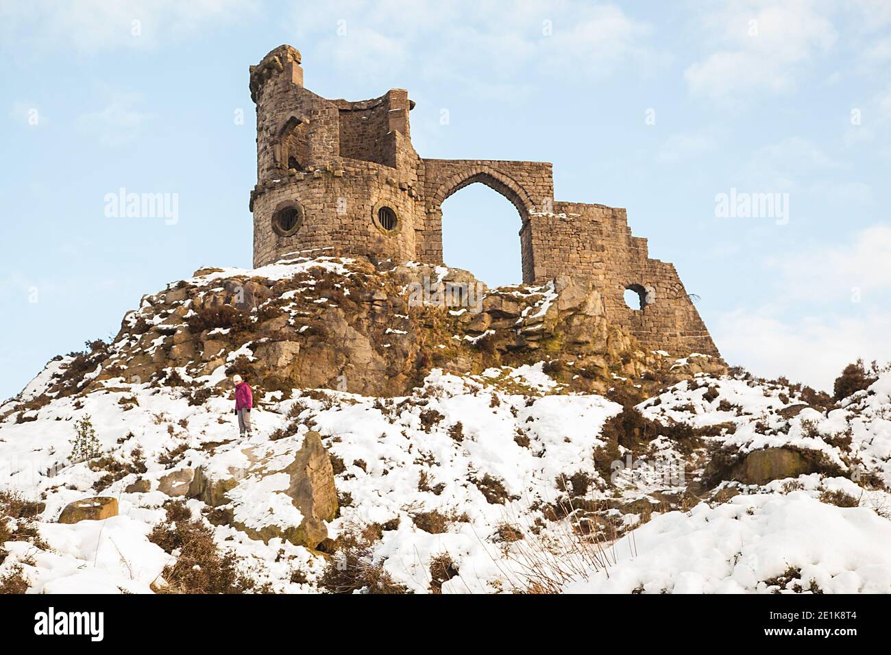 Mow Cop castle, the folly of a ruined castle in snow during winter