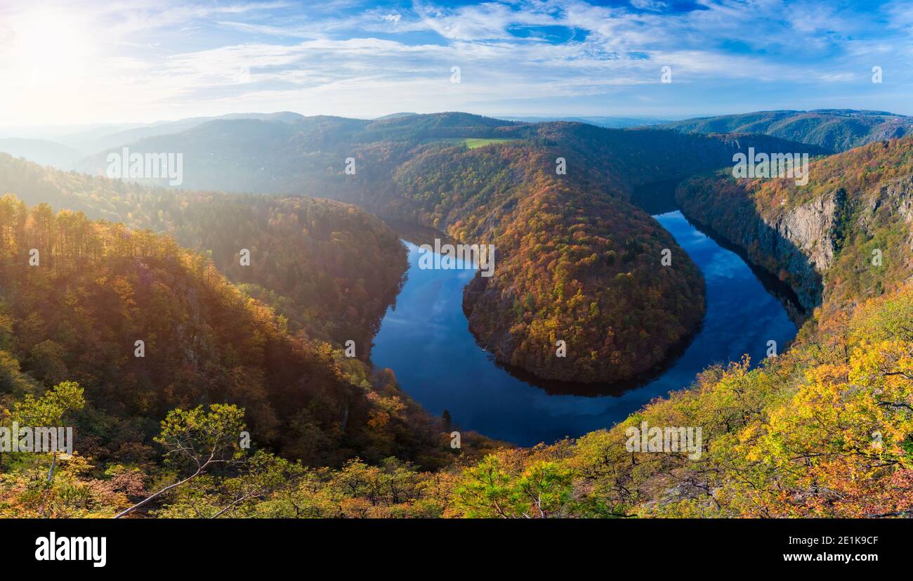 Beautiful Vyhlidka Maj, Lookout Maj, near Teletin, Czech Republic. Meander of the river Vltava surrounded by colorful autumn forest viewed from above. Stock Photo