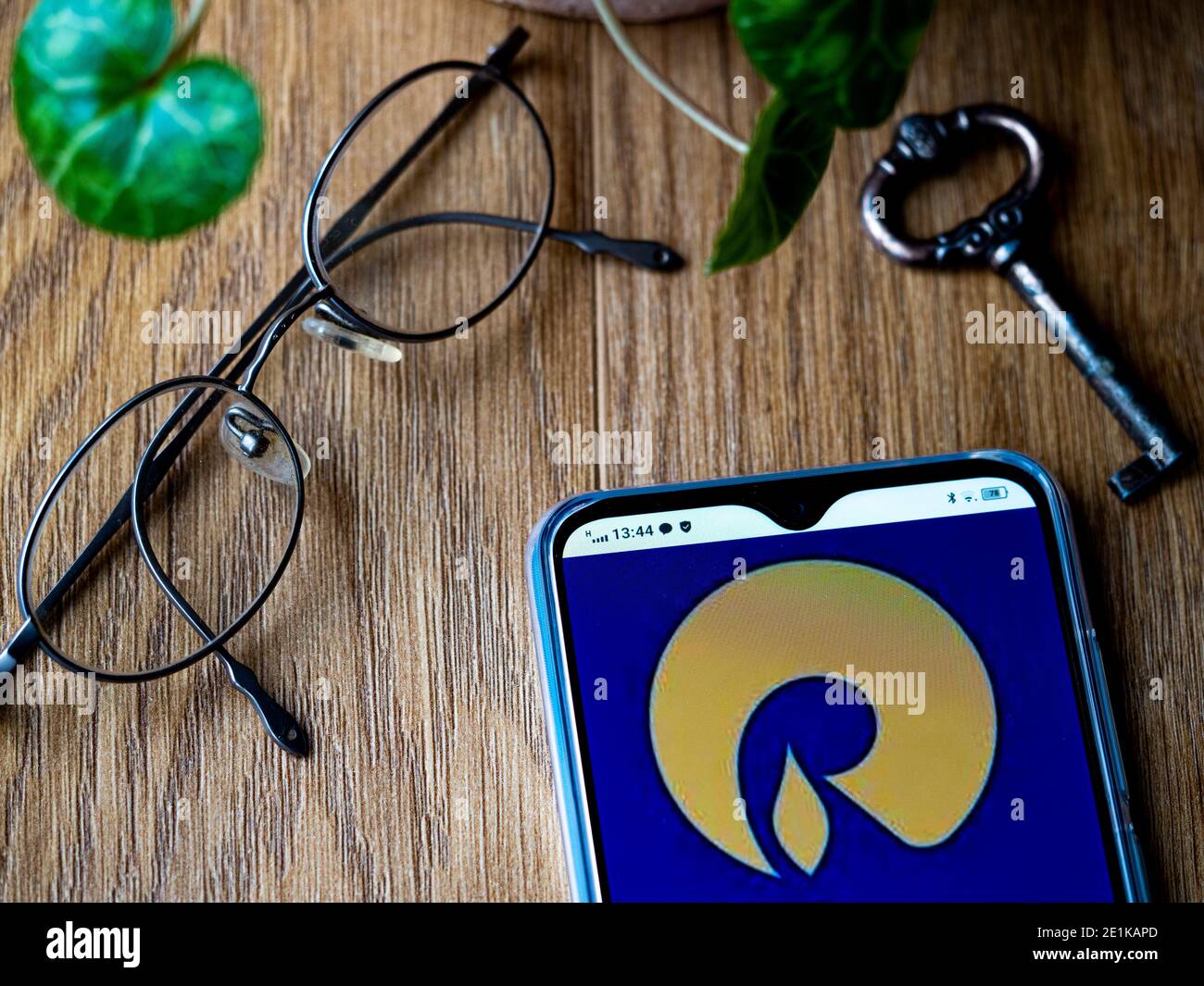 In this photo illustration a Reliance Industries, logo seen displayed on a smartphone. Stock Photo