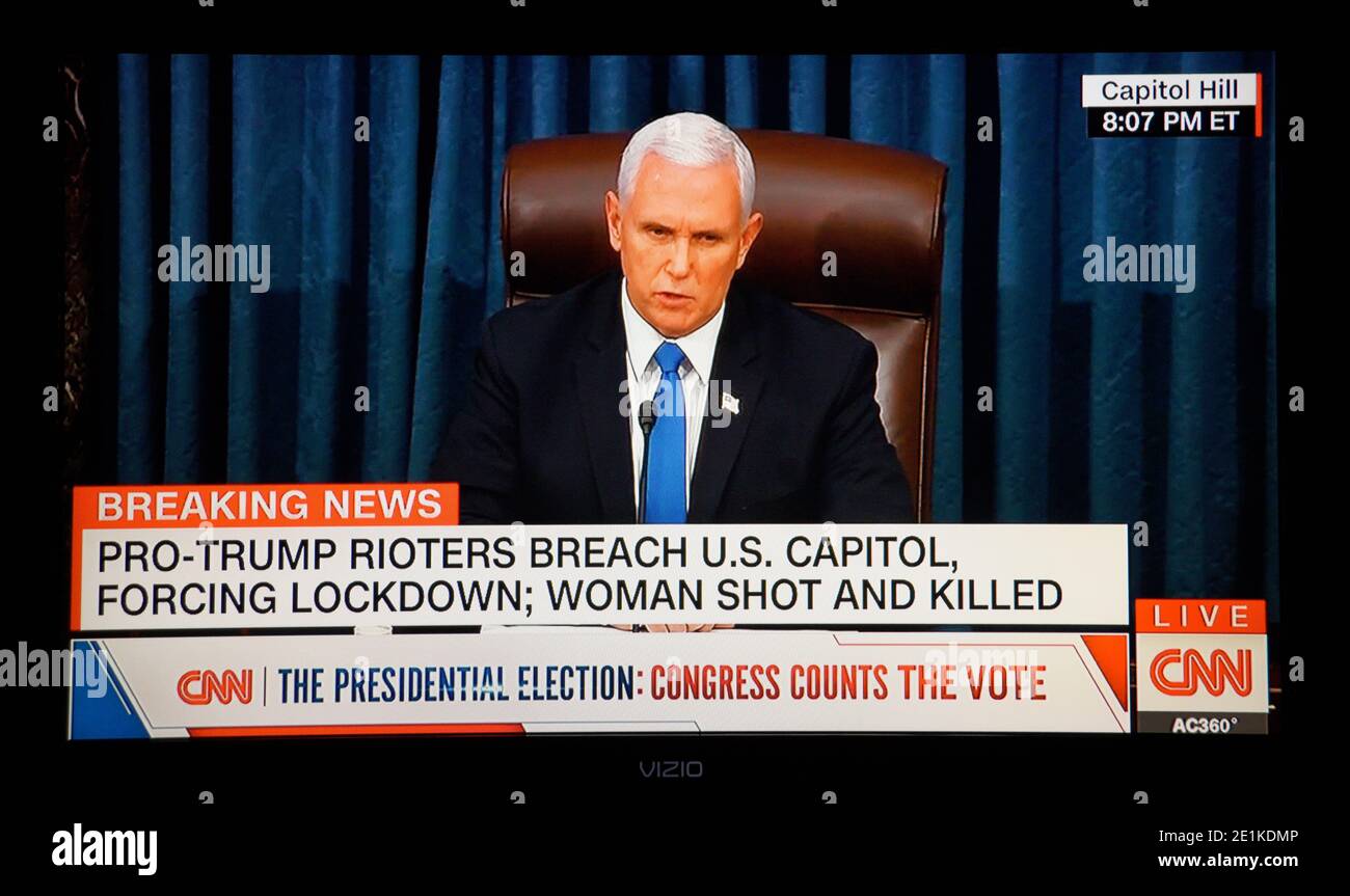 A CNN television screenshot of U.S.Vice President Mike Pence speaking during a joint session of Congress to ratify the 2020 President election. Stock Photo
