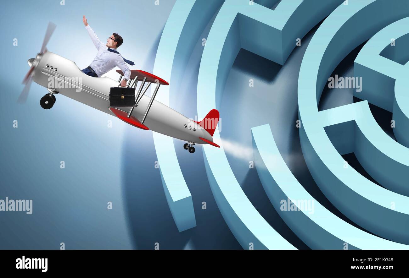 The businessman escaping from maze on airplane Stock Photo Alamy