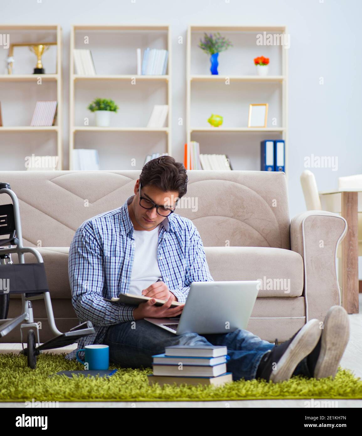 The young student studying at home Stock Photo - Alamy