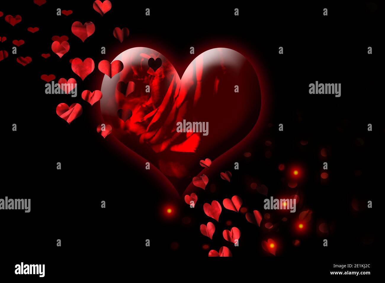 Valentine's Day. Red heart on black background Stock Photo - Alamy