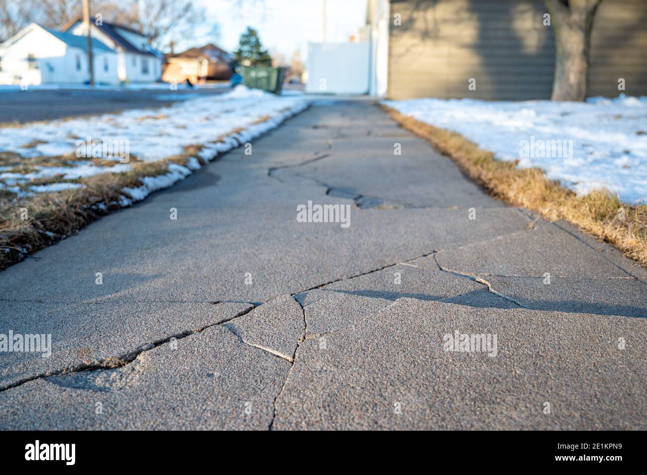 damaged concrete slabs caused by soil structure heave Stock Photo Alamy