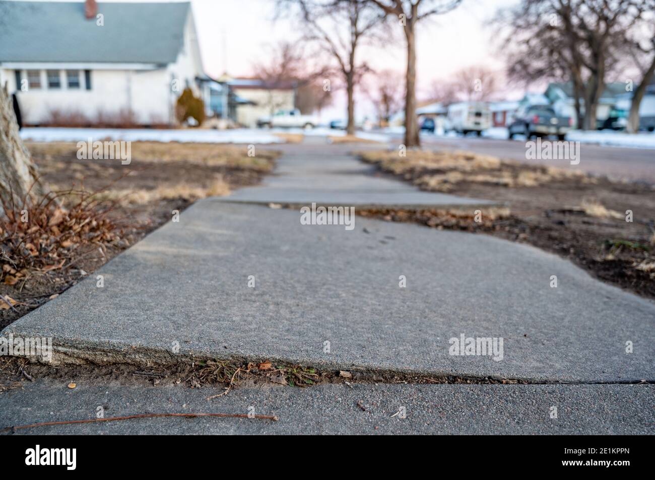 damaged concrete slabs caused by soil structure heave Stock Photo Alamy