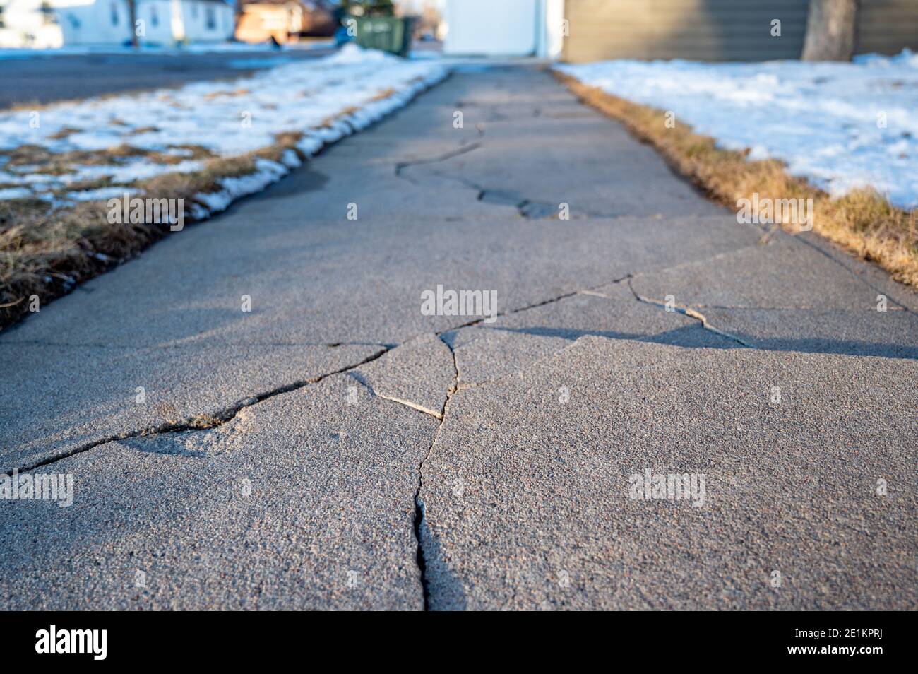 damaged concrete slabs caused by soil structure heave Stock Photo Alamy