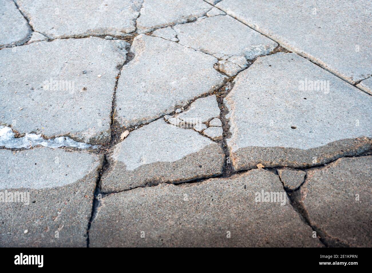damaged concrete slabs caused by soil structure heave Stock Photo Alamy