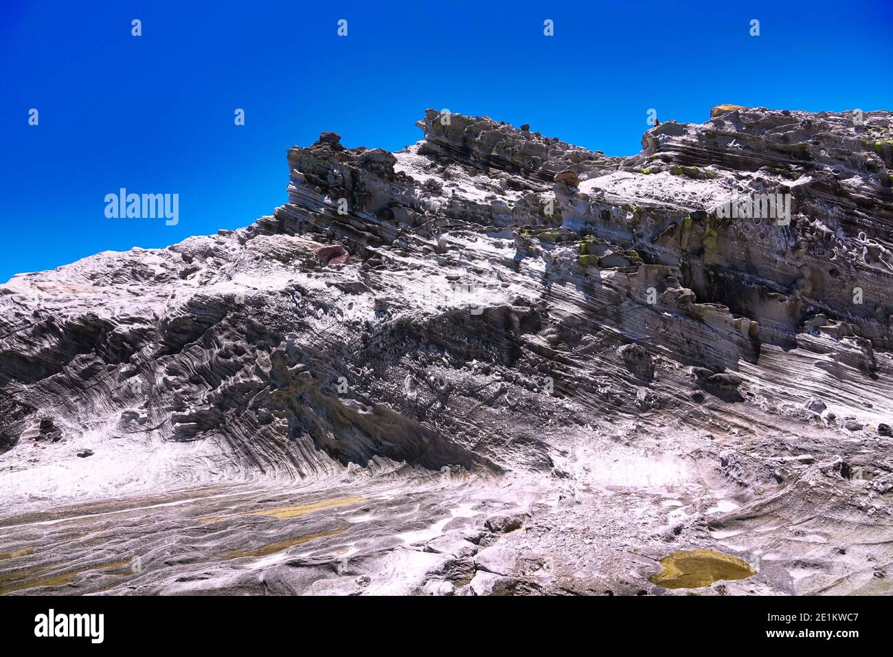 The rock was eroded by the wind for a long time, witnessing the passage of time. Hualien County, Taiwan is a very popular place for leisure travel. Stock Photo