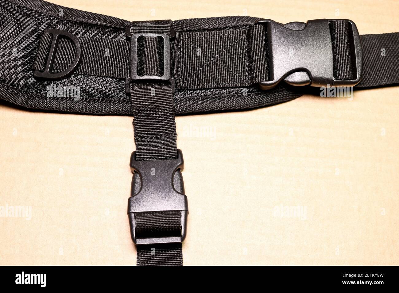Black plastic buckle fastex for backpacks. Accessories for backpacks