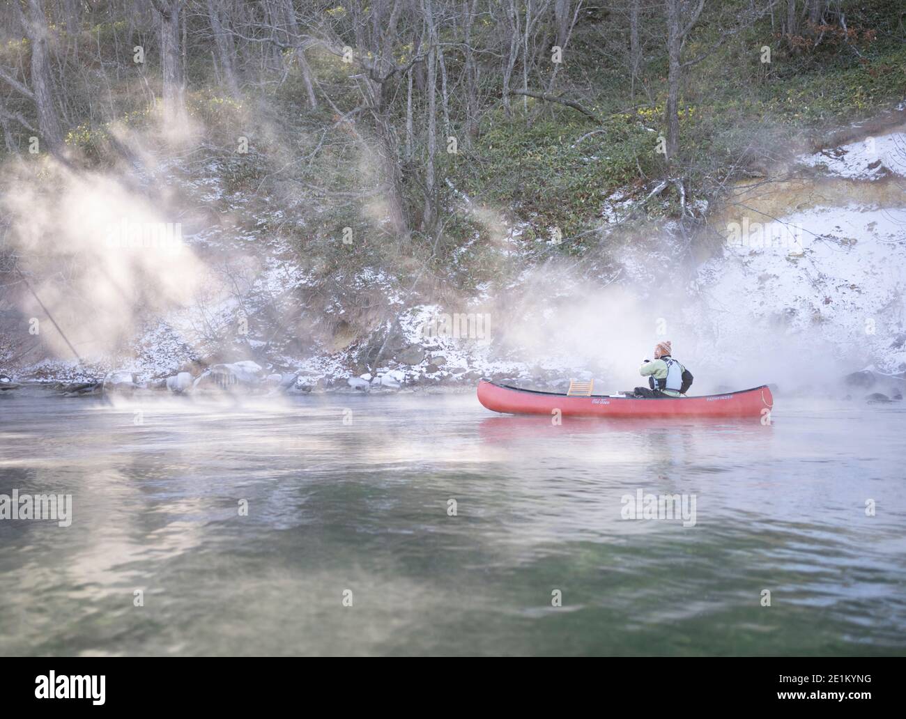 Local guide Kenichi Sobue winter canoeing on Lake Kussharo 屈斜路湖, Kussharo-ko caldera lake  Akan National Park,  Hokkaido, Japan. Stock Photo