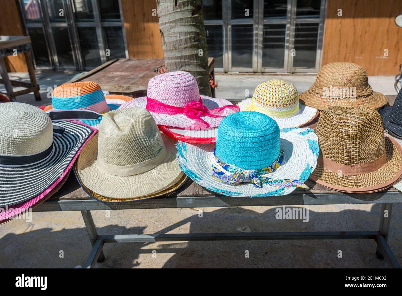 Men and women's beach hat for sale at the seaside market in Hailing Island,  Yangjiang,China Stock Photo - Alamy