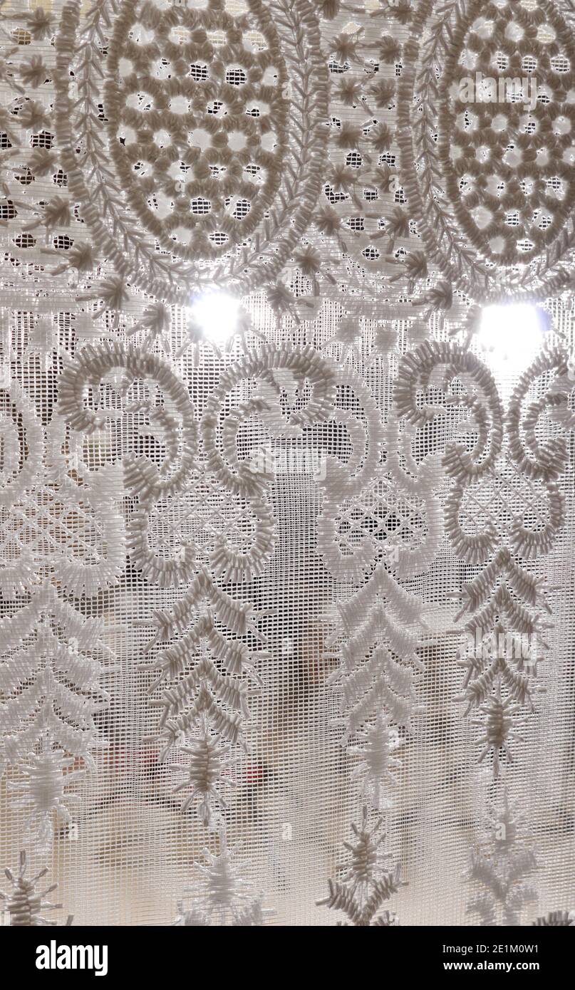 Elegant tulle curtain. Home decoration. Stock Photo