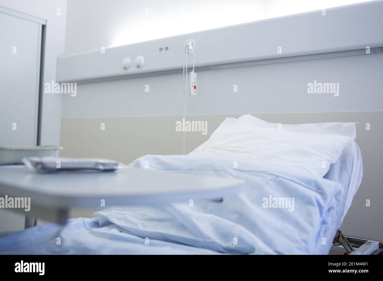 Empty hospital room with medical bed Stock Photo