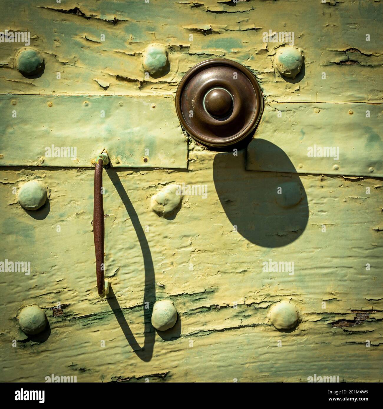 Shadow of door handle on wooden door. France Stock Photo Alamy