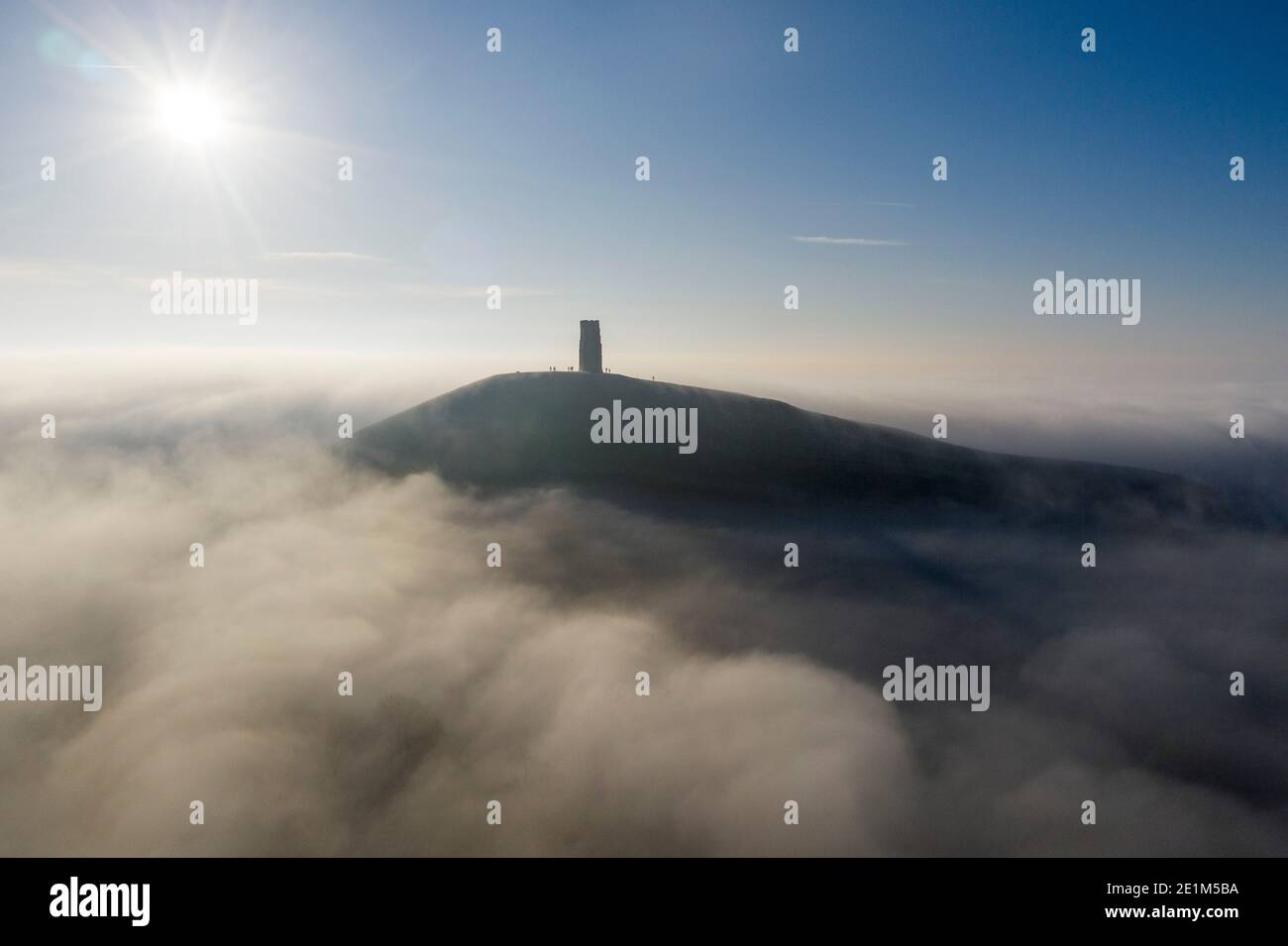 Glastonbury Tor amongst the mist. Stock Photo