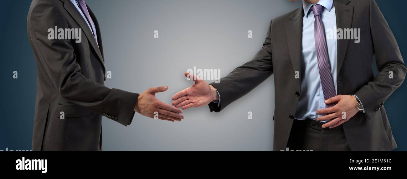 Business men become partners - Deal Business handshake concept Stock Photo