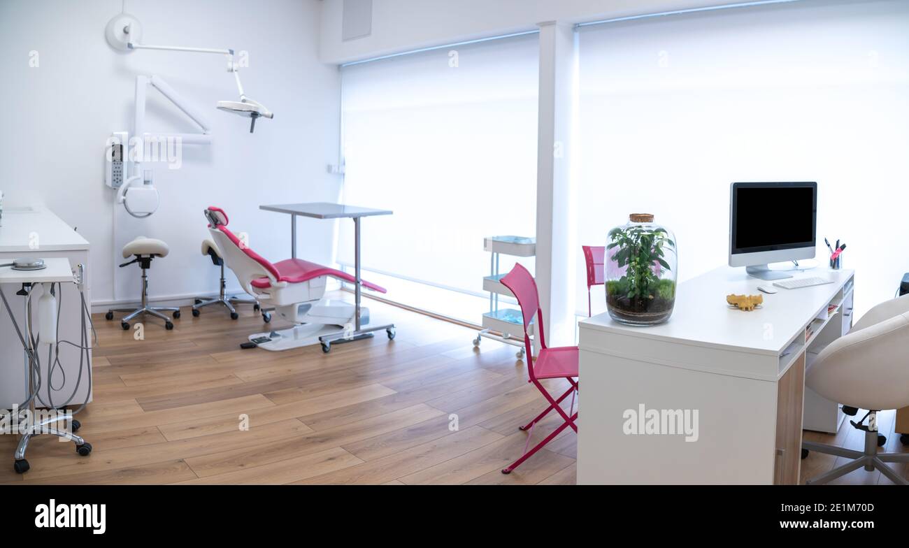 dental office interior with dentist chair and medical equipment Stock Photo