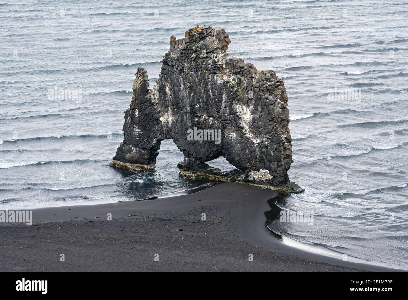Hvítserkur, a 15m high basalt sea stack on the coast of the Vatnsnes peninsula (Iceland) shaped like a rhino, known as the Troll of Northwest Iceland Stock Photo