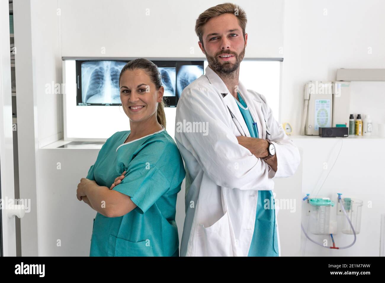 portrait of a young medical people smiling - isolated on blurred medical background with copy space Stock Photo