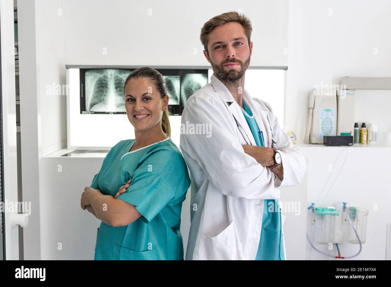portrait of a young medical people smiling - isolated on blurred medical background with copy space Stock Photo