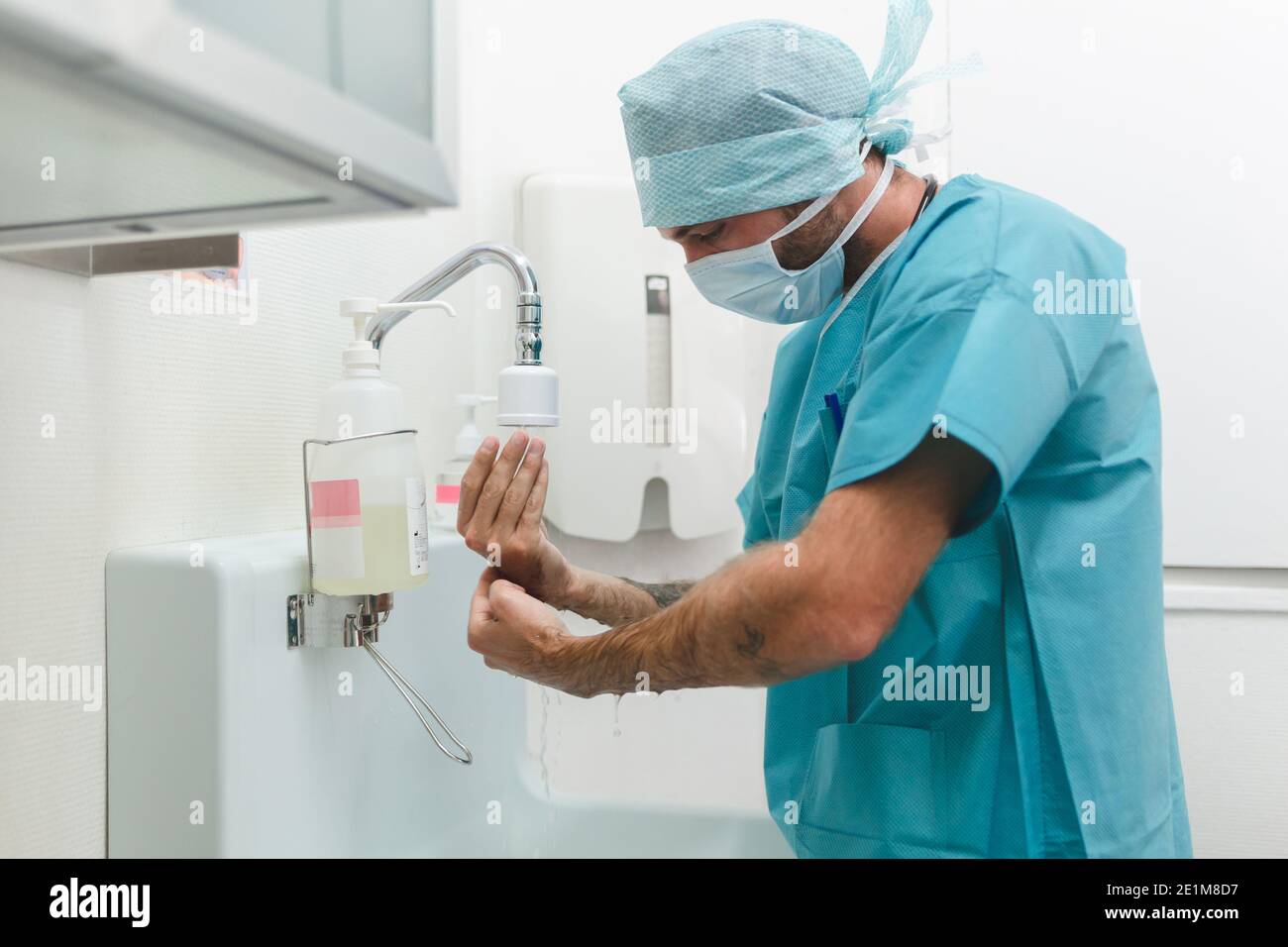 Surgeon or nurse washing hands before surgical intervention Stock Photo