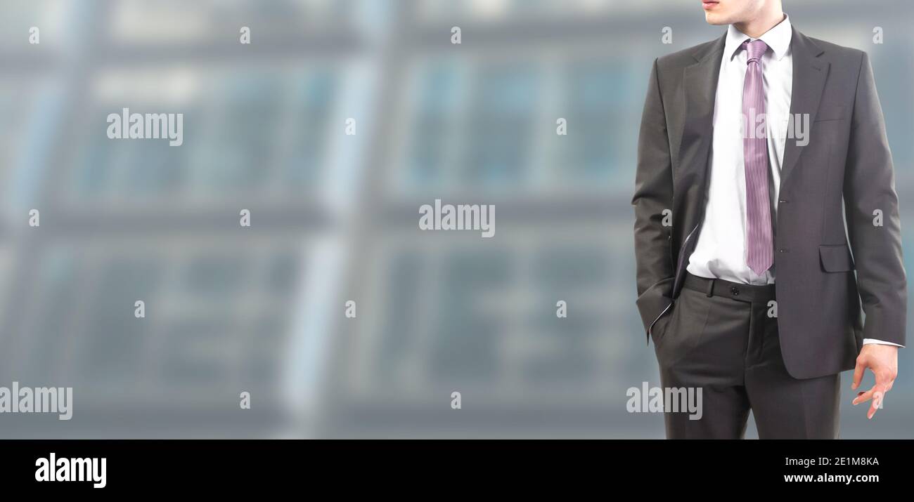 Business man working alone on laptop or with files, in background modern effect blurred Stock Photo
