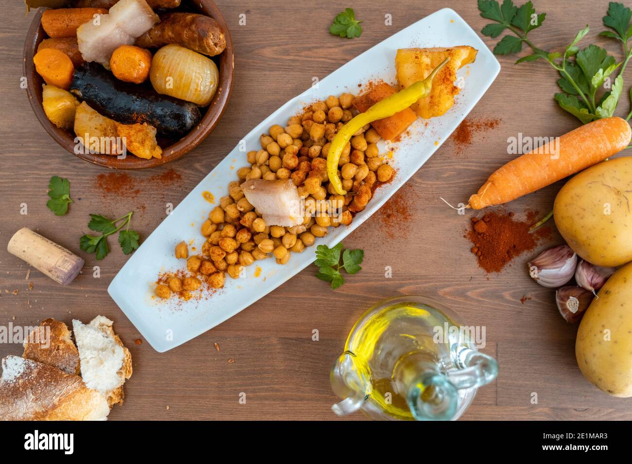 spanish traditional food cocido with chickpea and chorizo black pudding chickpeas bacon carrot potato Stock Photo