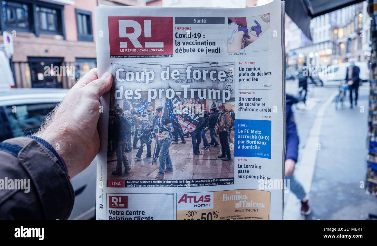 Paris, France - Jan 7, 2020: French newspaper Le republicain Lorrain front page show storming of the U.S. Capitol by supporters of U.S. President Dona Stock Photo