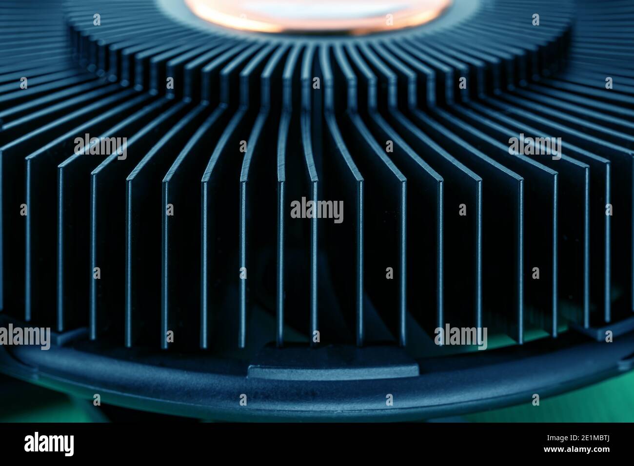 Cropped computer CPU cooling fan radiator toned turquoise blue green