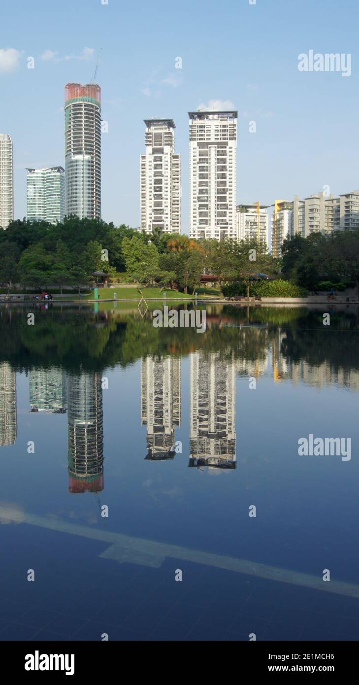 Kuala Lumpur, Malaysia - May 21 2012: The green oasis KLCC Park in central Kuala Lumpur Stock Photo