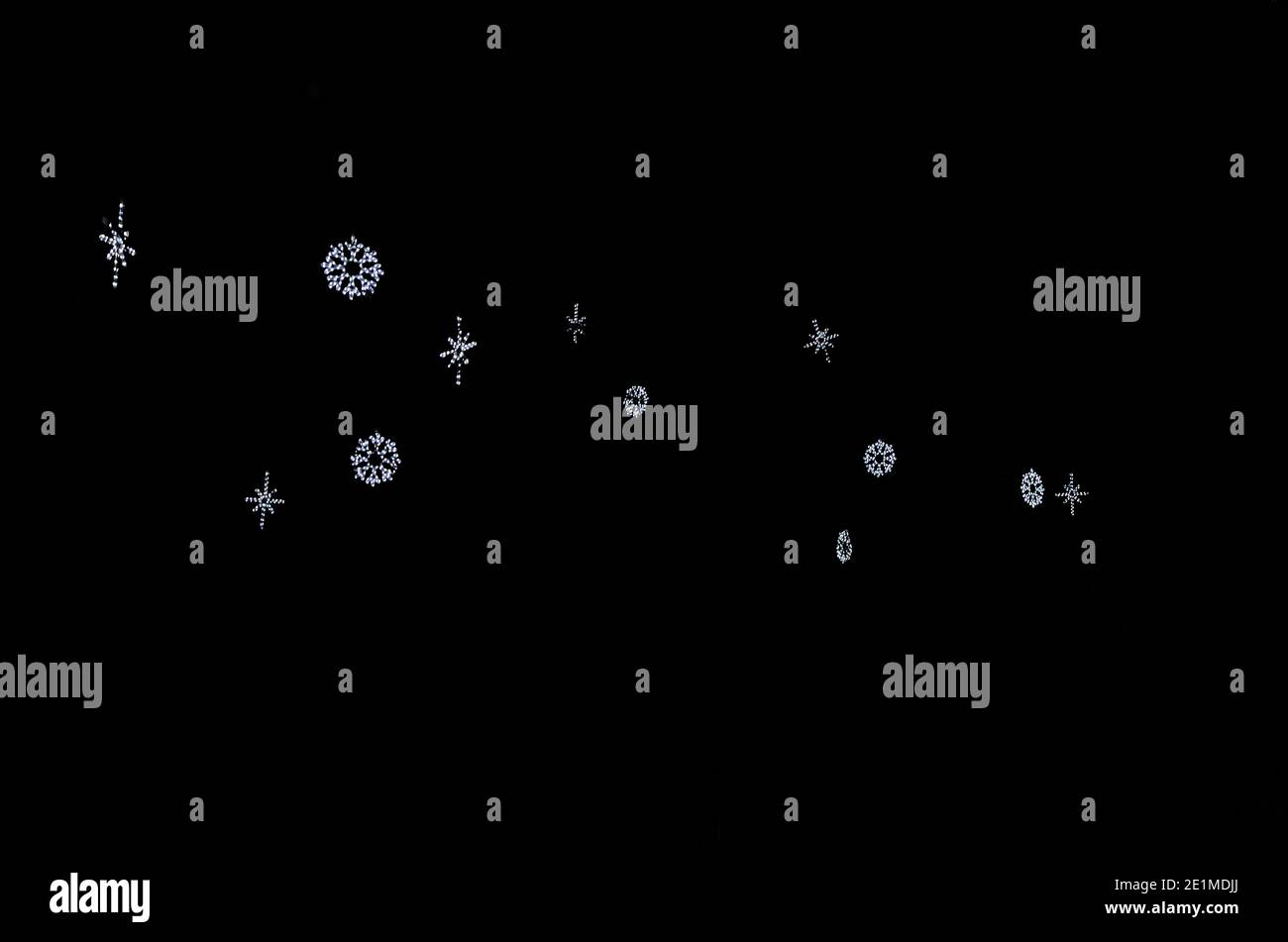 white lighted christmas stars at night Stock Photo Alamy